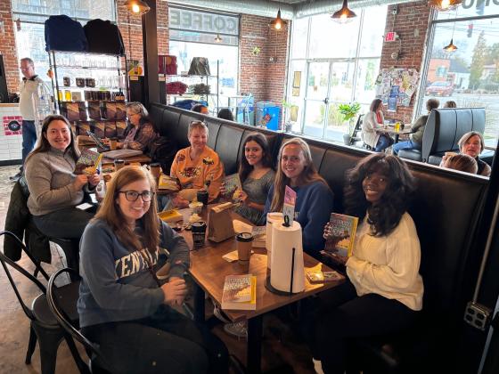 students sitting at table
